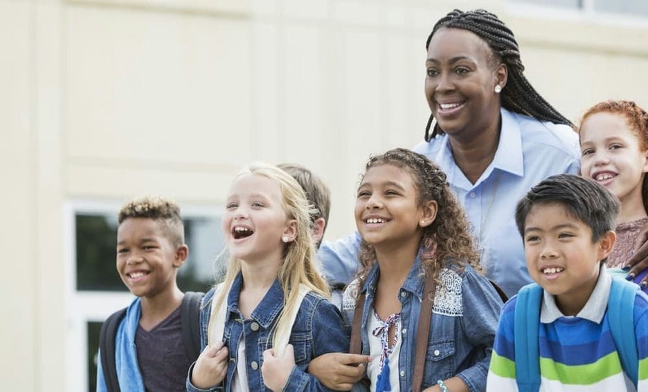 teacher with student happy on national school principal day